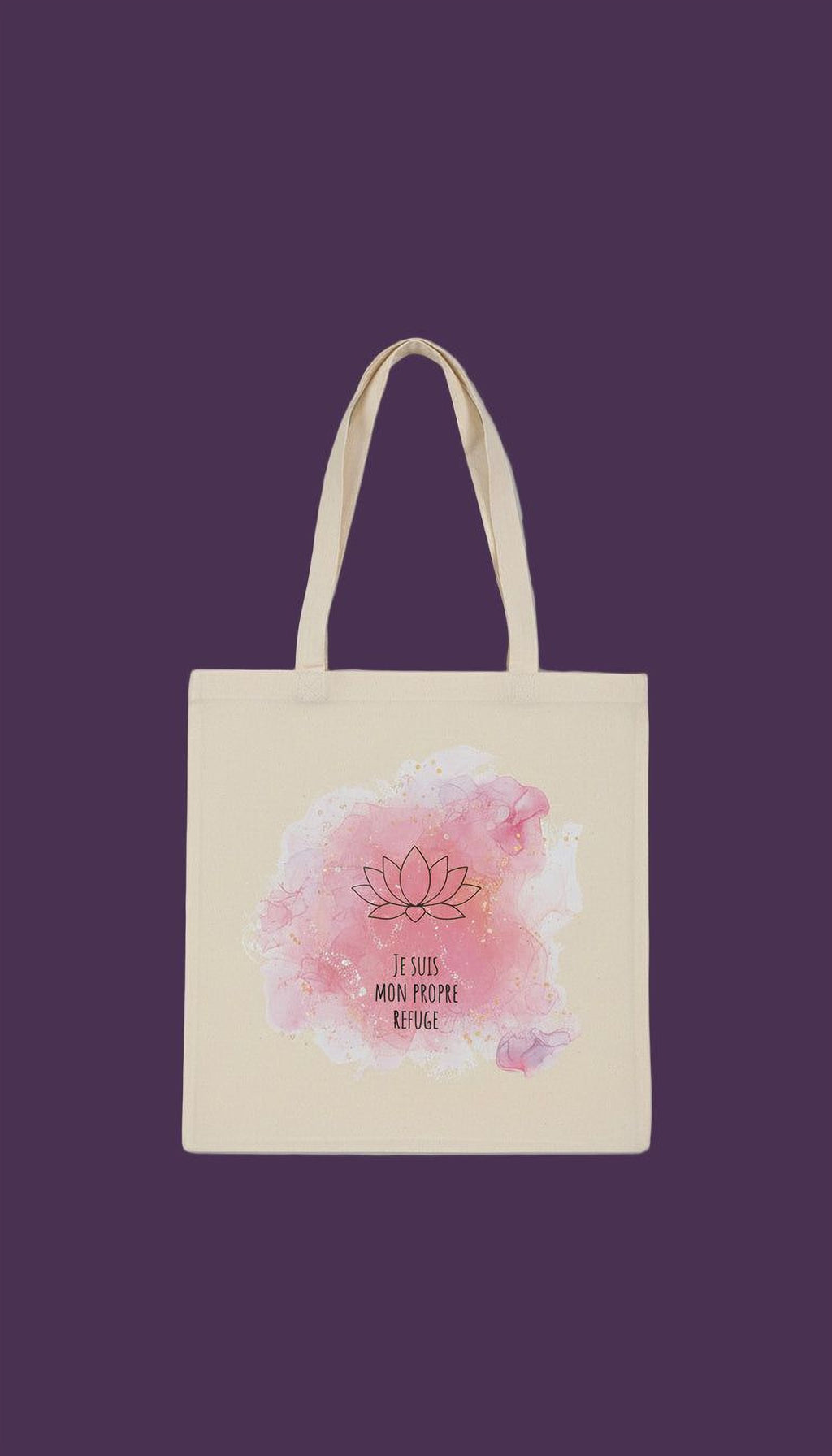 A beige tote bag with a pink watercolor design featuring a lotus flower and the text "Je suis monde propre refuge" (I am the world).